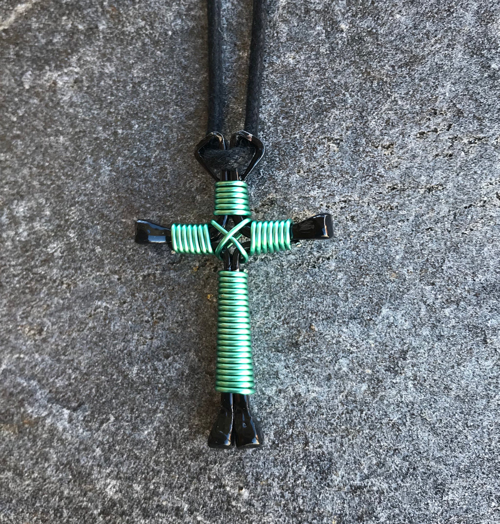 Seafoam Horseshoe Nail Cross Necklace With Black Nails